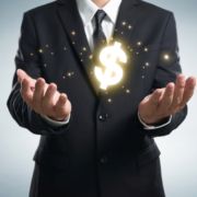 graphicstock businessman holding dollar symbol r jXnwesl